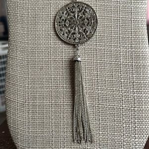 16” silver tone chain with medallion and chain tassel